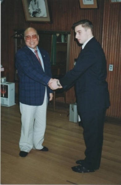 Масутацу Ояма и Николас Петтас