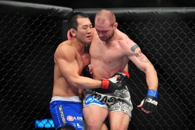 Юсин Оками – Роналдо Соуза